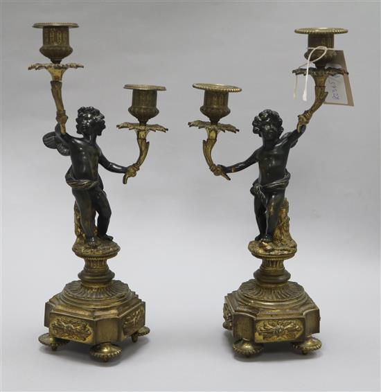 A pair of bronze and ormolu candelabra